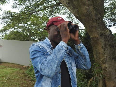 Themba testing out the new binoculars.