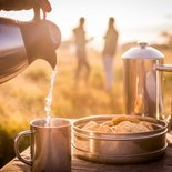 Morining coffee whilst on a family safari holiday game drive at Leopard Mountain Safari Lodge in KZN, South Africa.