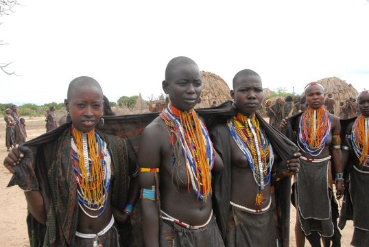 Erbore tribes- among the tribes of the Omo valley region, are famous by their big hut. Decorated with so many beads and necklaces, the young girls of Arbore tribes have the custom of shaving their hair  until they marry.