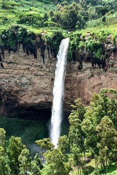 The main waterfall tumbling over the edge of Sipi Falls, Uganda.