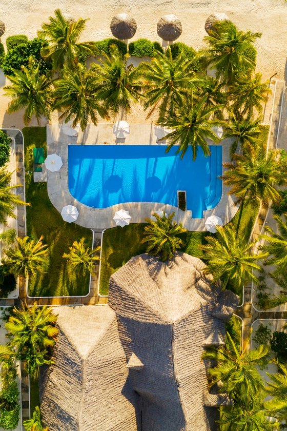 Aerial view of Kisiwa on the Beach in Zanzibar, a luxury all-villa resort with pool.