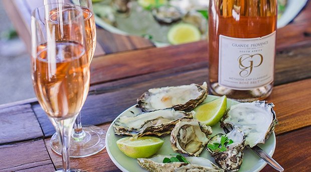 Oyster & Bubbly Happy Hour all summer at Grande Provence 