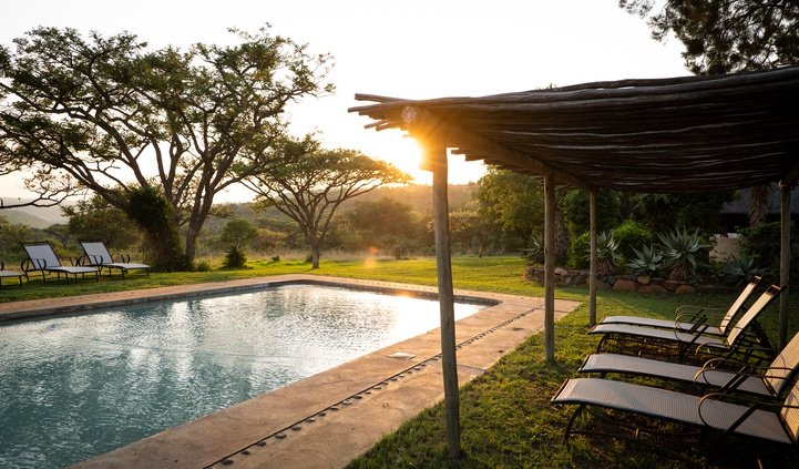 Enjoy a dip in the pool when on family holiday at Fugitives Drift Lodge & Guest House, KZN, South Africa.