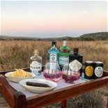 Sundowners an activity to enjoy whilst on a family safari holiday at Fugitives Drift Lodge & Guest House, KZN, South Africa