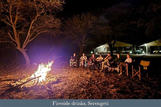 Fireside drinks and chat, Serengeti