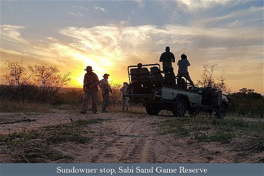 Tour group having sundowners in the Sabi Sands