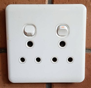 Type M wall sockets common in South Africa. 