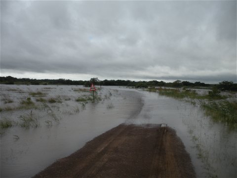 The Mpate River that feeds Lake St Lucia in Flood over the road on the way to Makakatana Bay Lodge