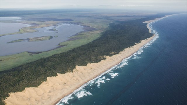 Lake St Lucia separated from the Indian Ocean by the largest vegetated sand dunes in Africa