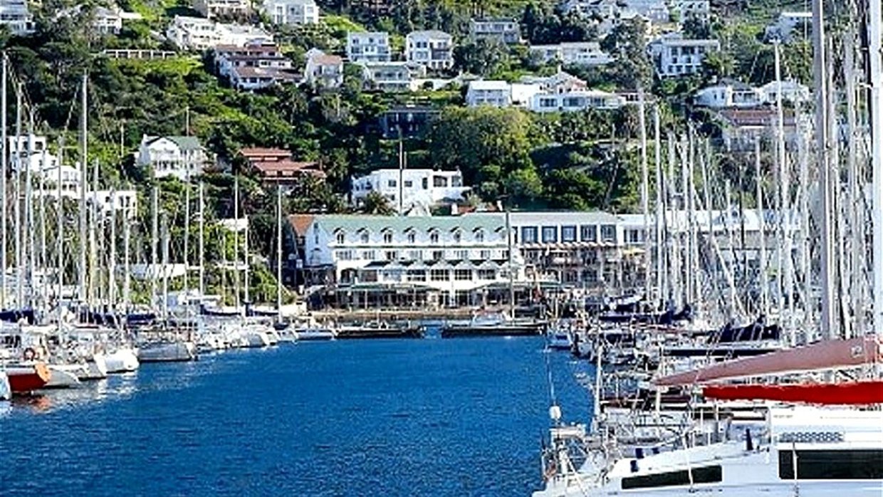 Yachts and quayside buildings in Simon's Town harbour, False Bay
