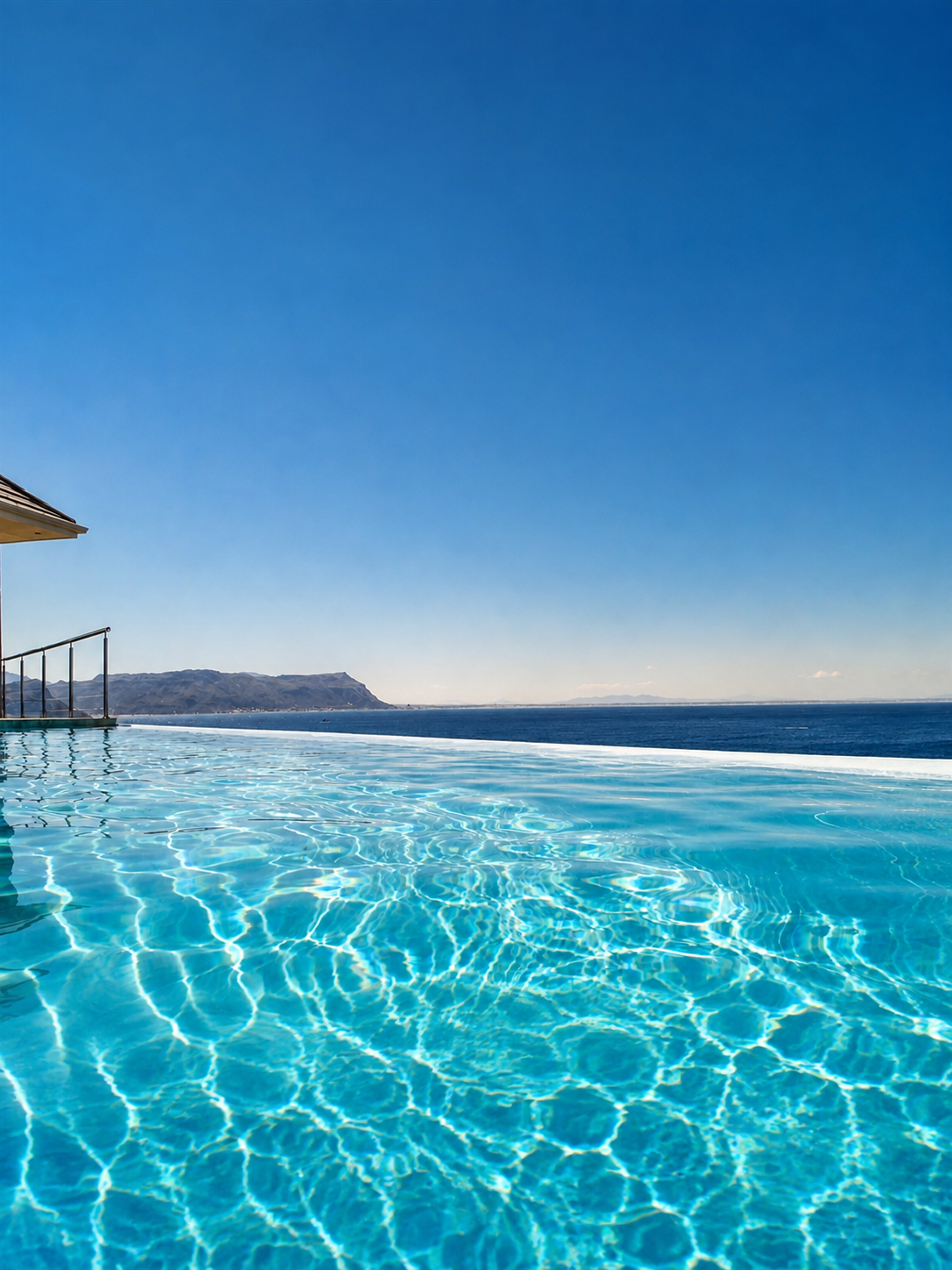 False Bay and the pool at Aqua Terra Boutique Guesthouse in Simon's Town