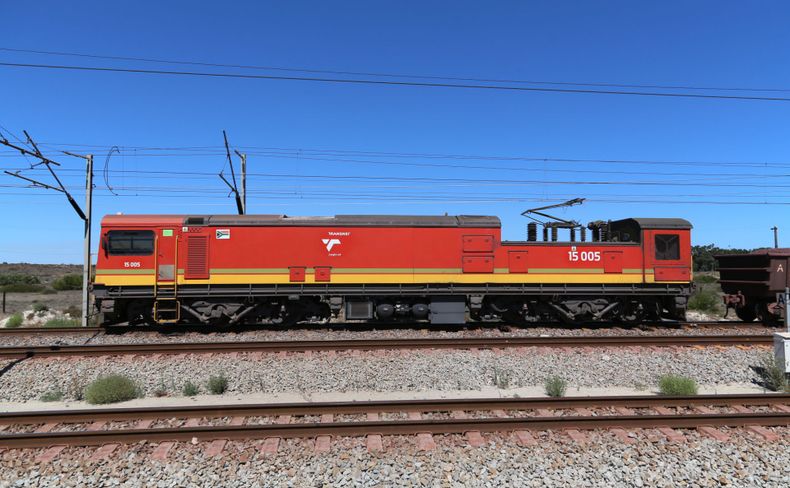 Archive red Transnet Class 15E locomotive on the Sishen-Saldanha railway line, photographed in February 2015