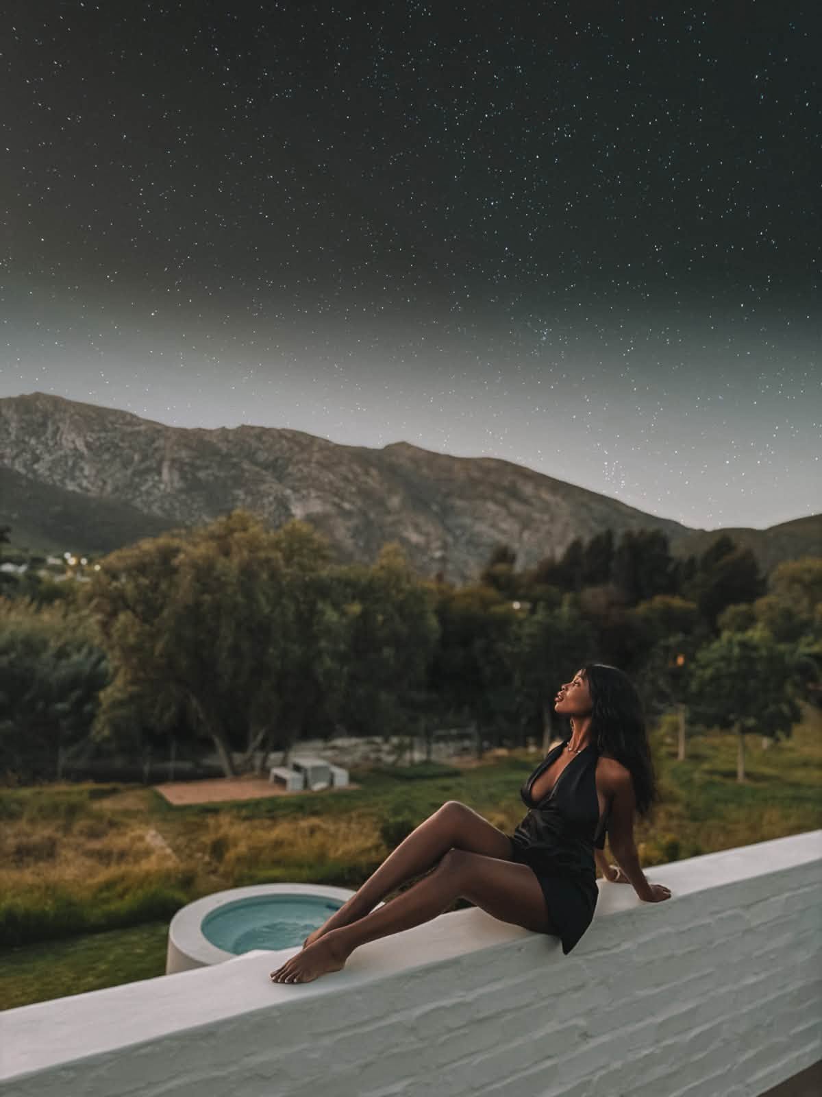 STIL view from rooftop with night sky and stars