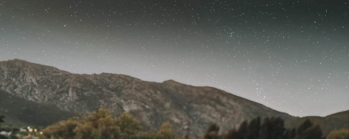 STIL view from rooftop with night sky and stars