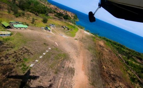 A cessna caravan bush flight, operated by Safari Air Link, taking off from Mahale airstrip in Mahale Mountains National Park 