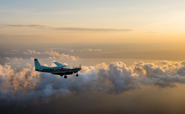 A Safari Air Link Cessna Grand Caravan flying across Tanzania
