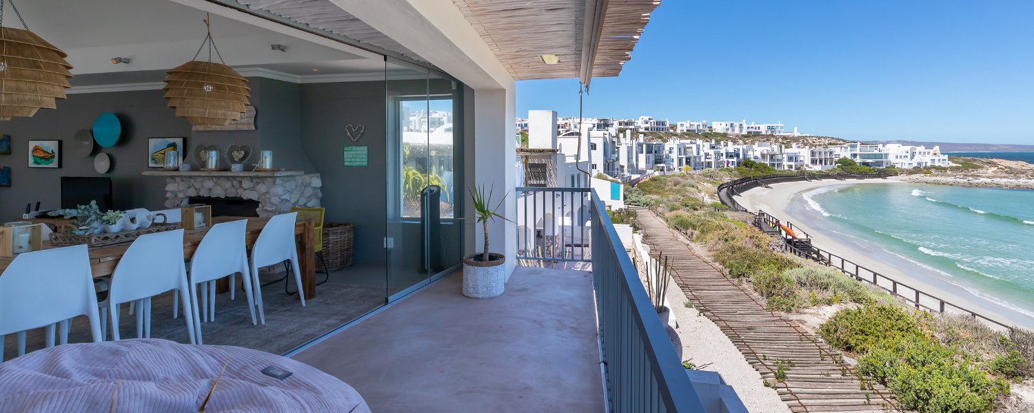 Balcony with Seaview and Private Beach View. The house is a front row home with an unobstructed view of the beach and sea