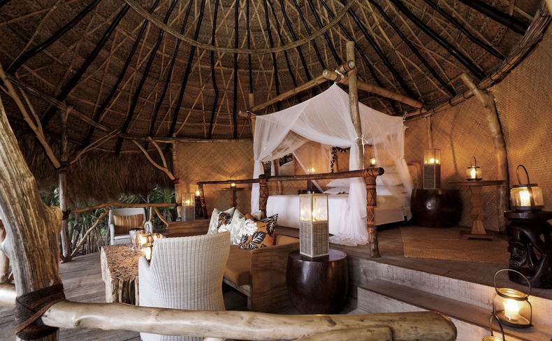 Hilltop sleep-out with a canopy bed overlooking tropical ocean at Dolphin Island Hilltop sleep-out with a canopy bed overlooking tropical ocean at Dolphin Island