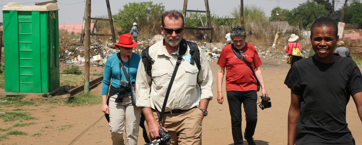 Neville Jones with Experiential Travel guests in Soweto