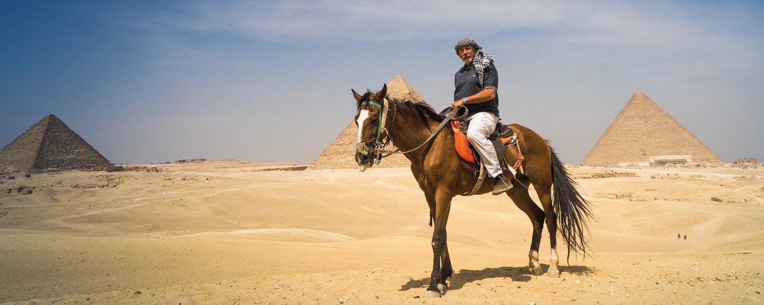 The best way to see the Giza pyramids is on horseback