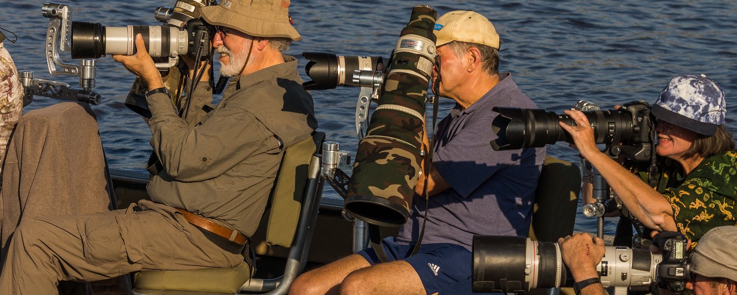 Photography enthusiasts on the Chobe River, Botswana