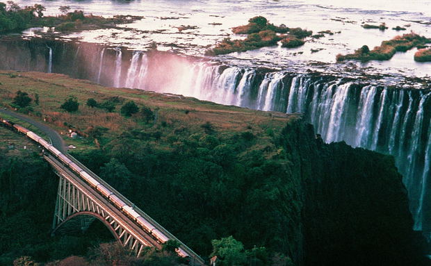 Victoria Falls and train on bridge
