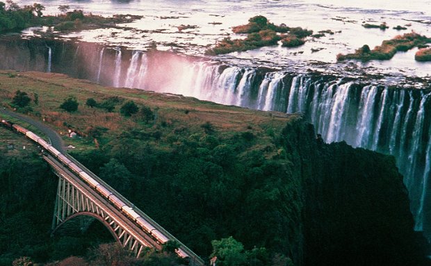 Victoria Falls and train on bridge