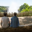 Visitors looking out at Victoria Falls