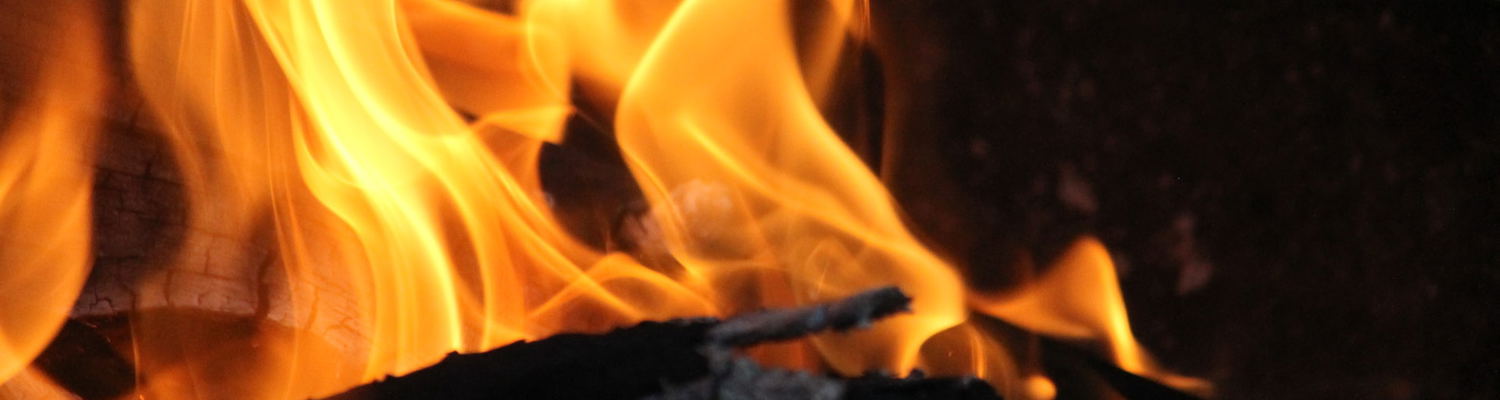 Braai fire. Photo by Tiaan Nell on Unsplash. tiaan-nell-7hprpVkKaU0-unsplash