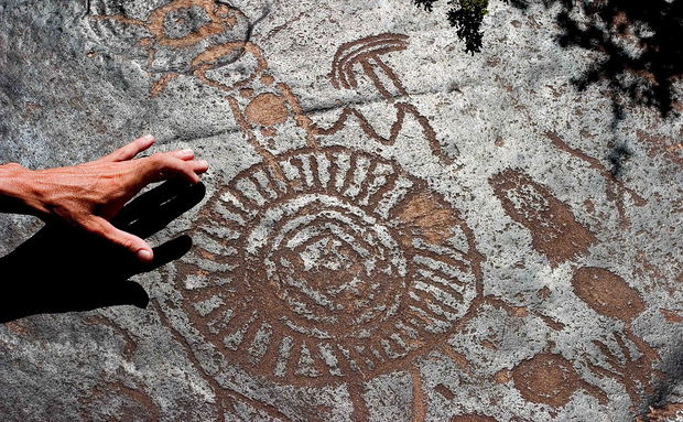 Bushman Rock art Image South African Tourism via Wikimedia Commons Rock_Art_Nelspoort_-_Central_Karoo,_South_Africa_(3883087983)