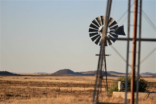 Windmills of the Karoo. Photo by Neal Markham on Unsplash neal-markham-ocvXOq-jCgw-unsplash