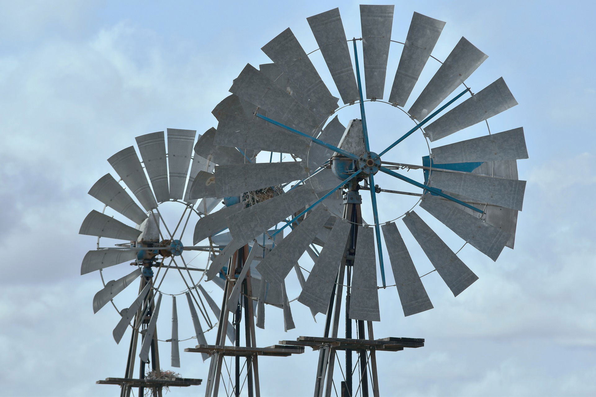 Windmills of the Karoo. Photo by Peter Holmes on Pixabay windmills-3673942_1920