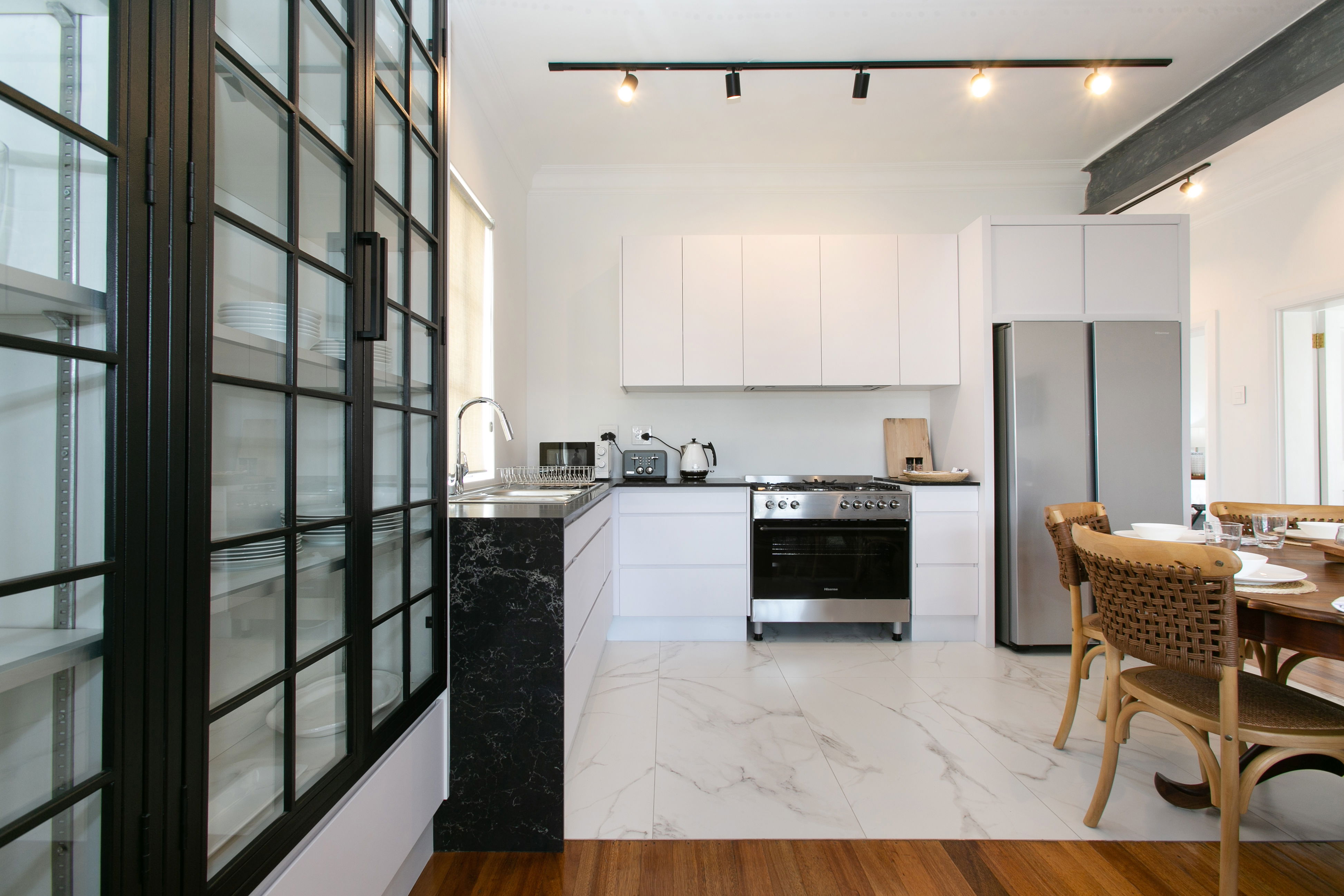 Open plan kitchen with gas hob, fridge freezer, double basin at La Maison On Main Self-Catering Villa, Paarl