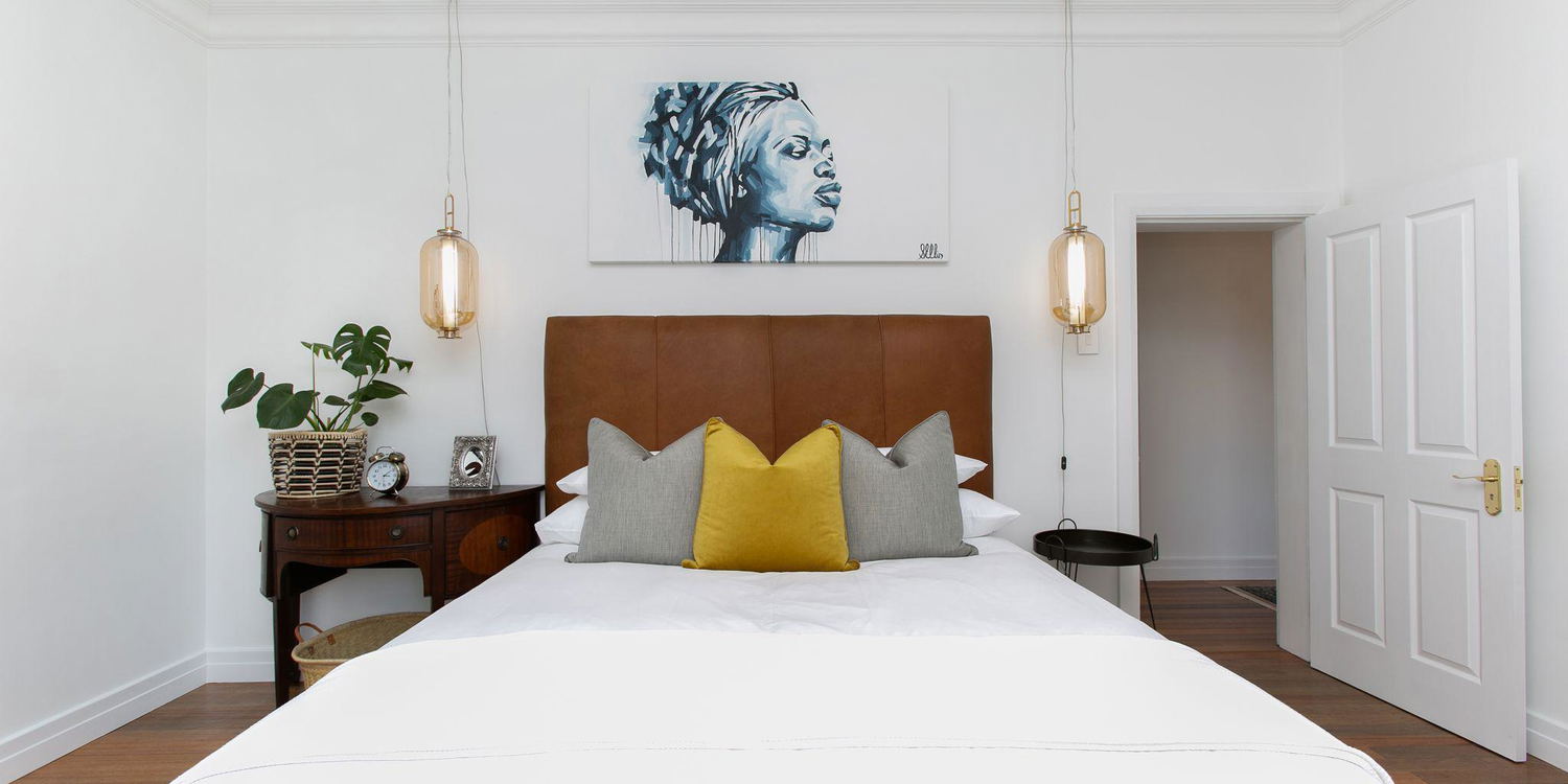Master bedroom king extra length bed at La Maison On Main, Paarl