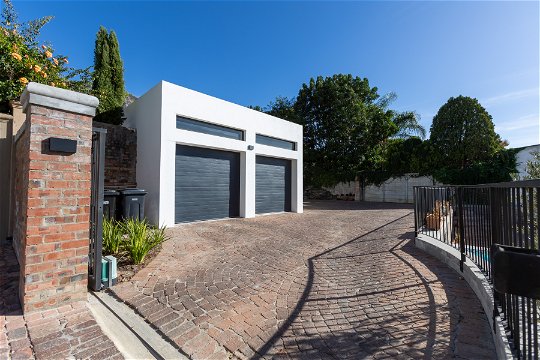Back secure entrance to courtyard parking at La Maison On Main Self Catering, Paarl