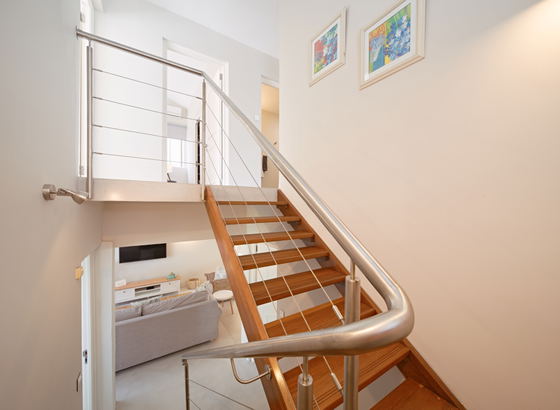 Staircase to upstairs area Staircase to upstairs area