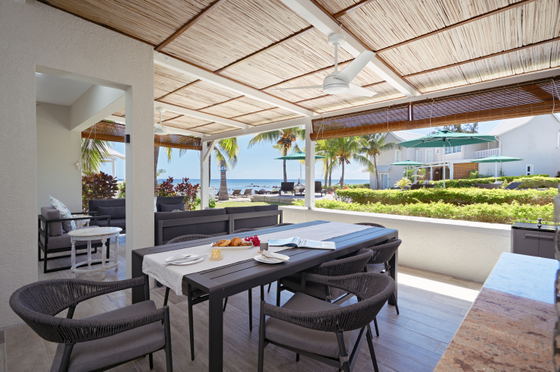 Outdoor dining set with covered patio and sea view Outdoor dining set with covered patio and sea view