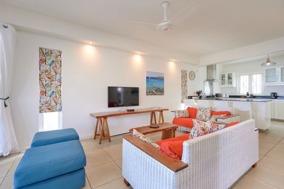Living room with wood furniture and open-plan design