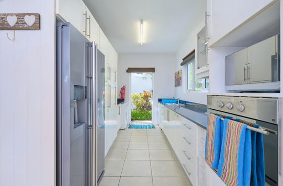 Kitchen, double door fridge and wash-up area