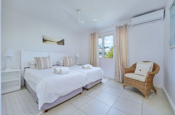 Bedroom, seating area, and bright light 
