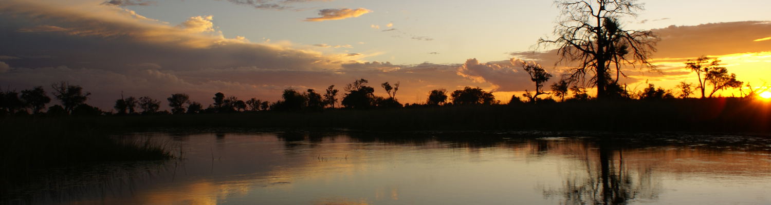Sunset reflection in the waters of the Okavango Delta, Botswana