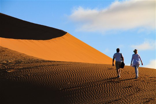 Walking along the red dunes.