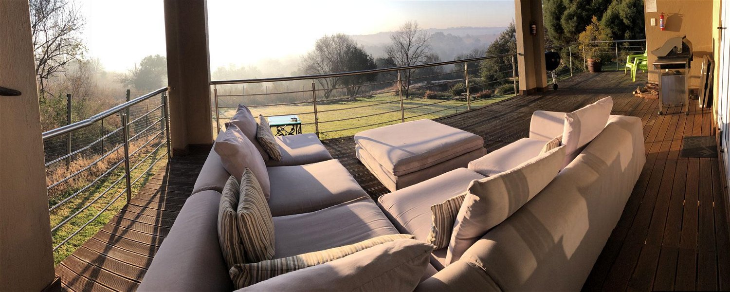 Hills and Dales Accommodation Lanseria - Fish Eagle Lodge deck and view in the early morning