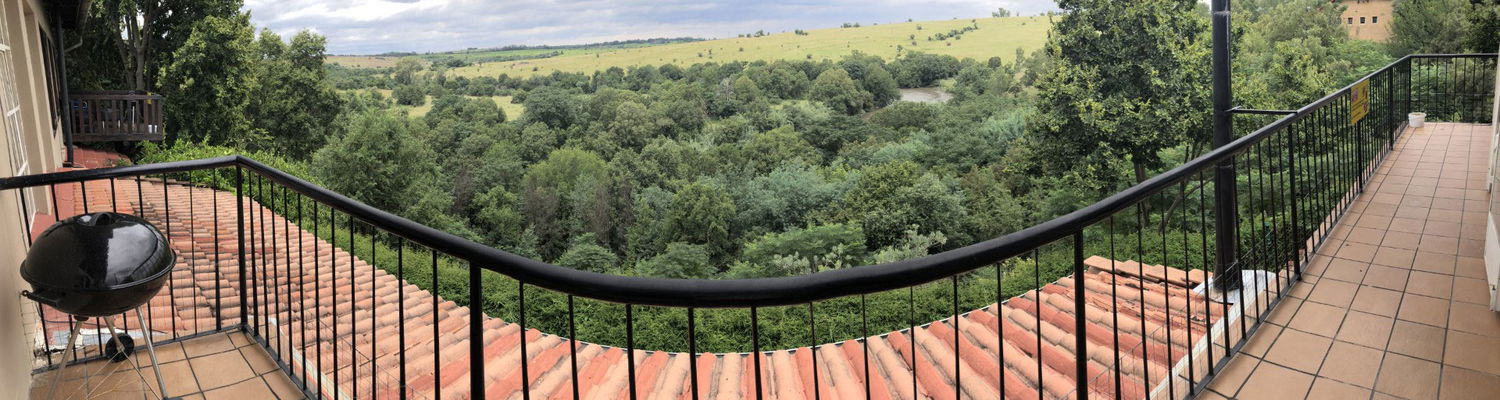 Hadeda family unit at Hills and Dales Accommodation, situated next to Lanseria Airport.  Fireplace to keep you toasty, two-bedroom unit, spacious lounge, fully stocked kitchenette with lovely view over river.  It features a garage underneath the unit.