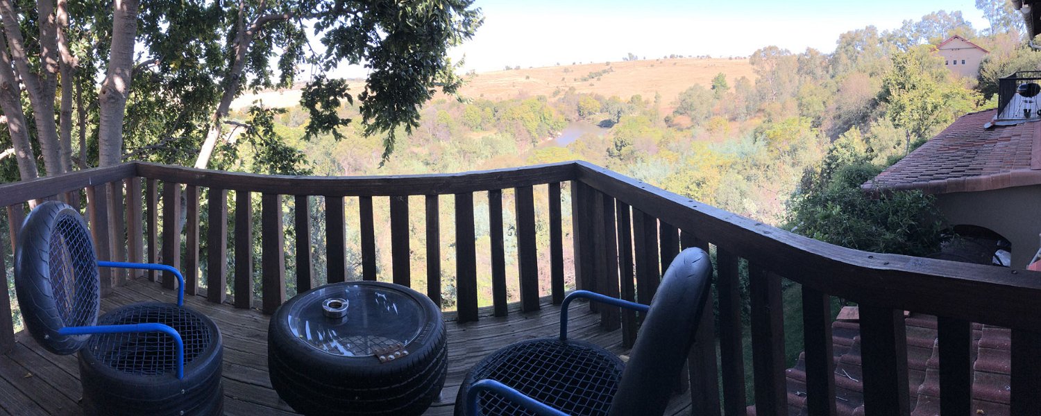 Hills and Dales Accommodation - Starling deck overlooking the Jukskei River and Lanseria Airport.