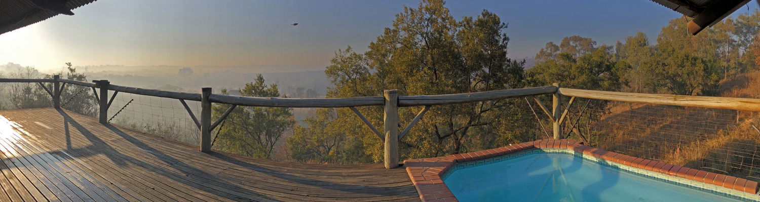 Jabulani Venue at Hills and Dales Accommodation in the early morning mist from the river.  It is a very popular even venue with functions such as bachelor and bachelorette parties, birthday events, team building and the like.  Situated next to Lanseria Airport it is also very convenient.  It has a big party centre and sleeps 34 people.  Great for a school dormitory outing and sleepover, backpackers, hikers.