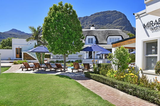 Our guesthouse swimming pool with mountain views in Franschhoek