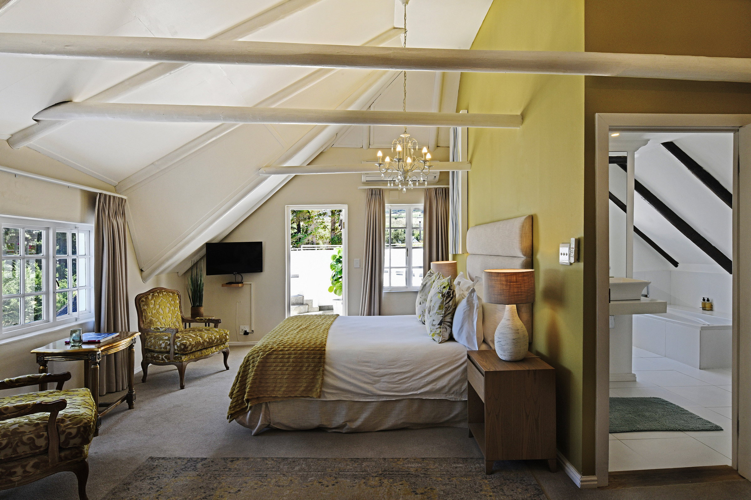 Guest room with ensuite bathroom and in-room spa treatment option in Franschhoek