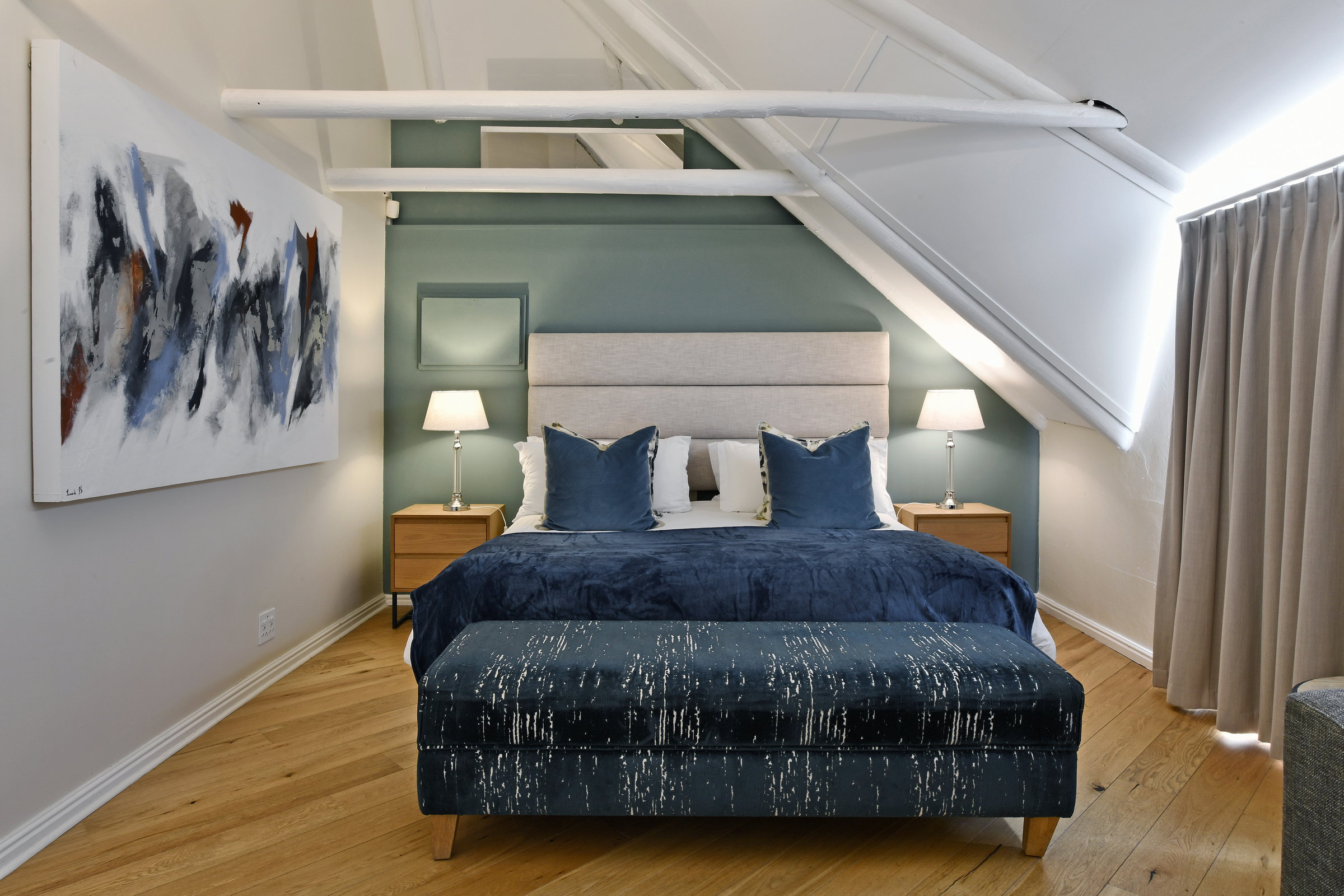 Luxury bedroom at Mirabelle Guesthouse in Franschhoek with ensuite bathroom