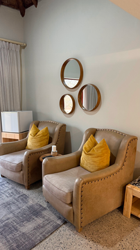 lounge seating with warm tones and elegant detailing. This cozy corner provides the perfect spot to unwind in comfort and style.